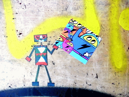 Street-Art: Roboter klebt Astronaut